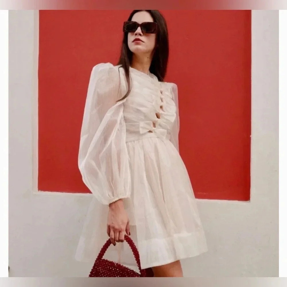 Gold bow front mini dress. Sofie the Label - Picture 2 of 6